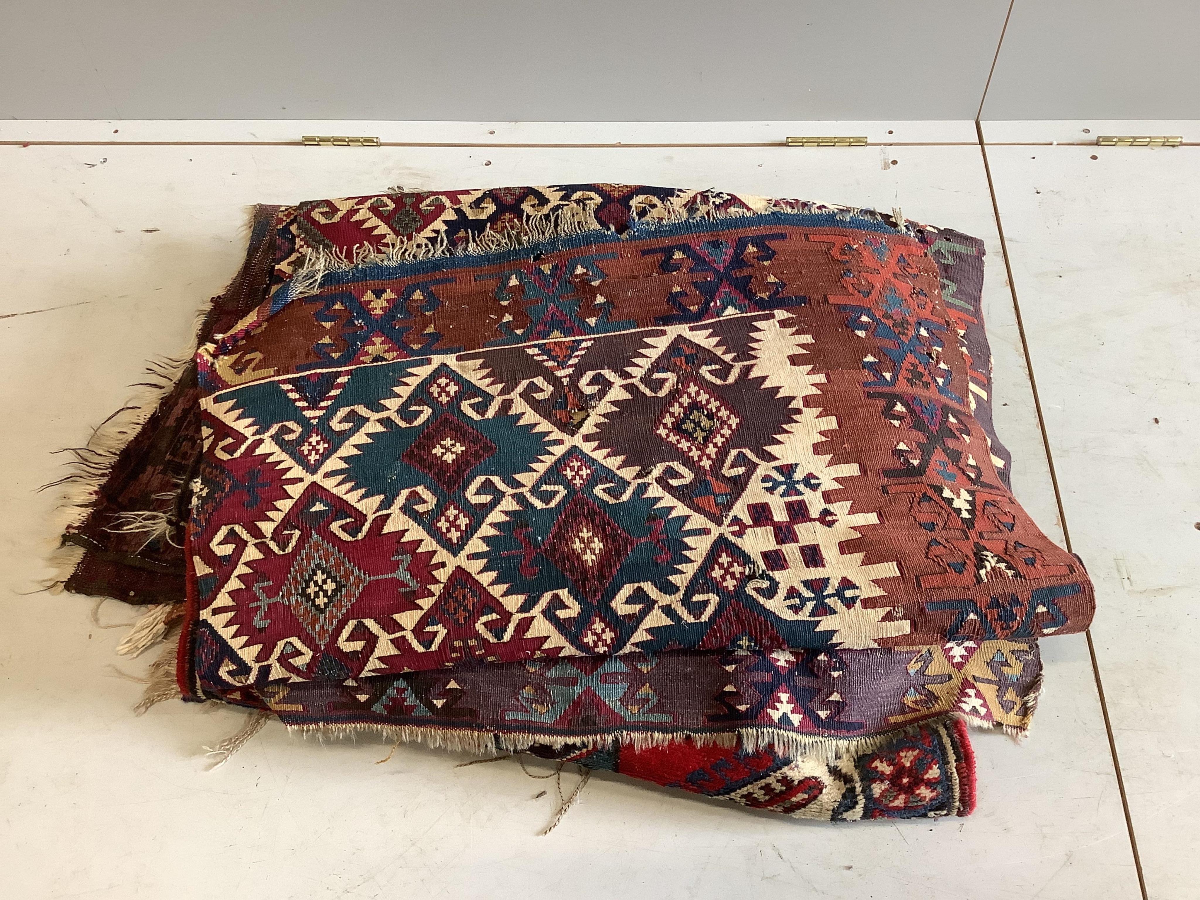 A quantity of assorted antique and later rugs, fragments, etc. Condition - poor